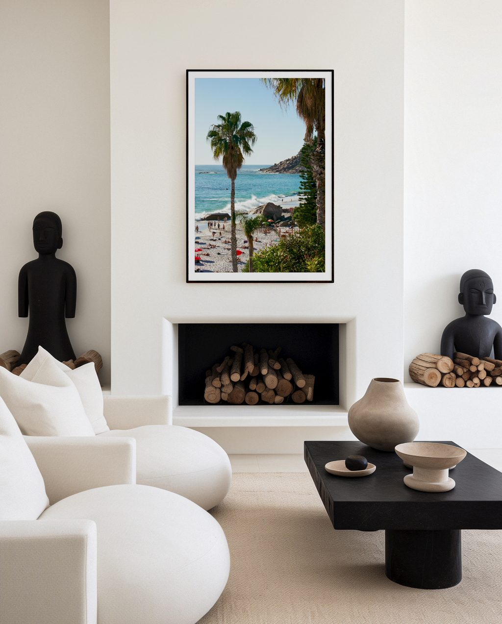 Modern living room with a fireplace, white sofa, and decorative items.